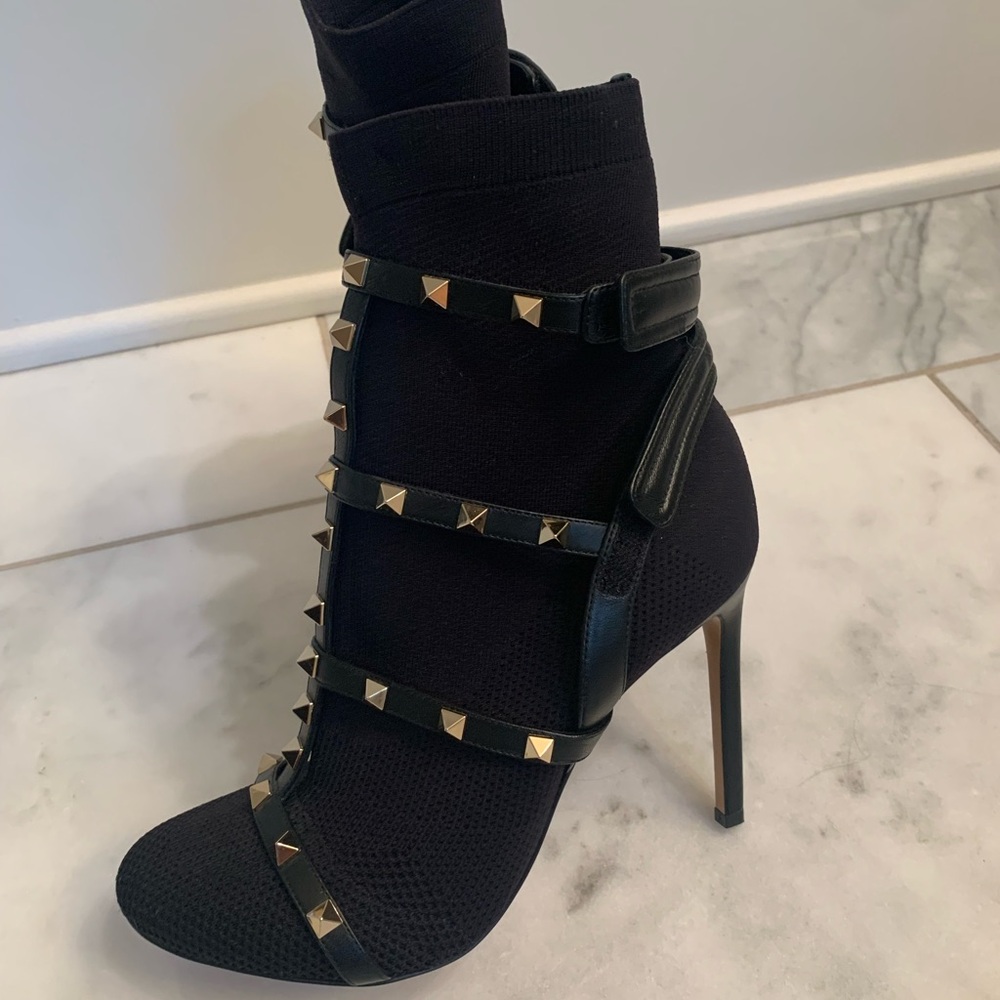 Brand New NEVER WORN VALENTINO BOOTS . Above ankle height , high heel.